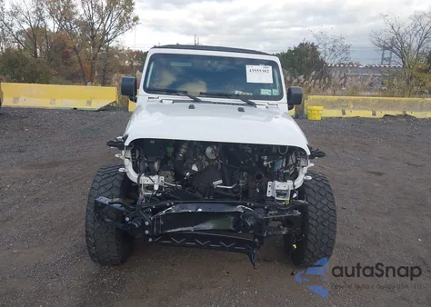 2022 Jeep Wrangler Unlimited Willys 4X4 z USA, uszkodzony, nr VIN 1C4HJXDMXNW142768